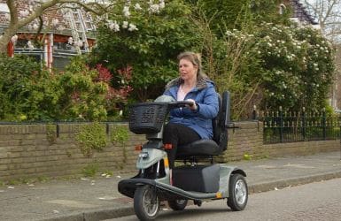 Woman on a mobility scooter
