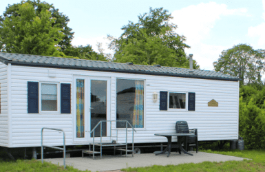 mobile home caravan in forest