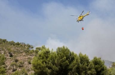 Vacation forest fires extinguish helicopter