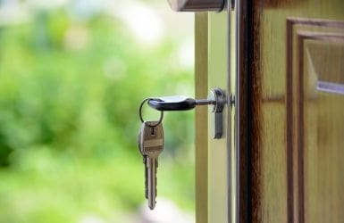 Key in outer door of house